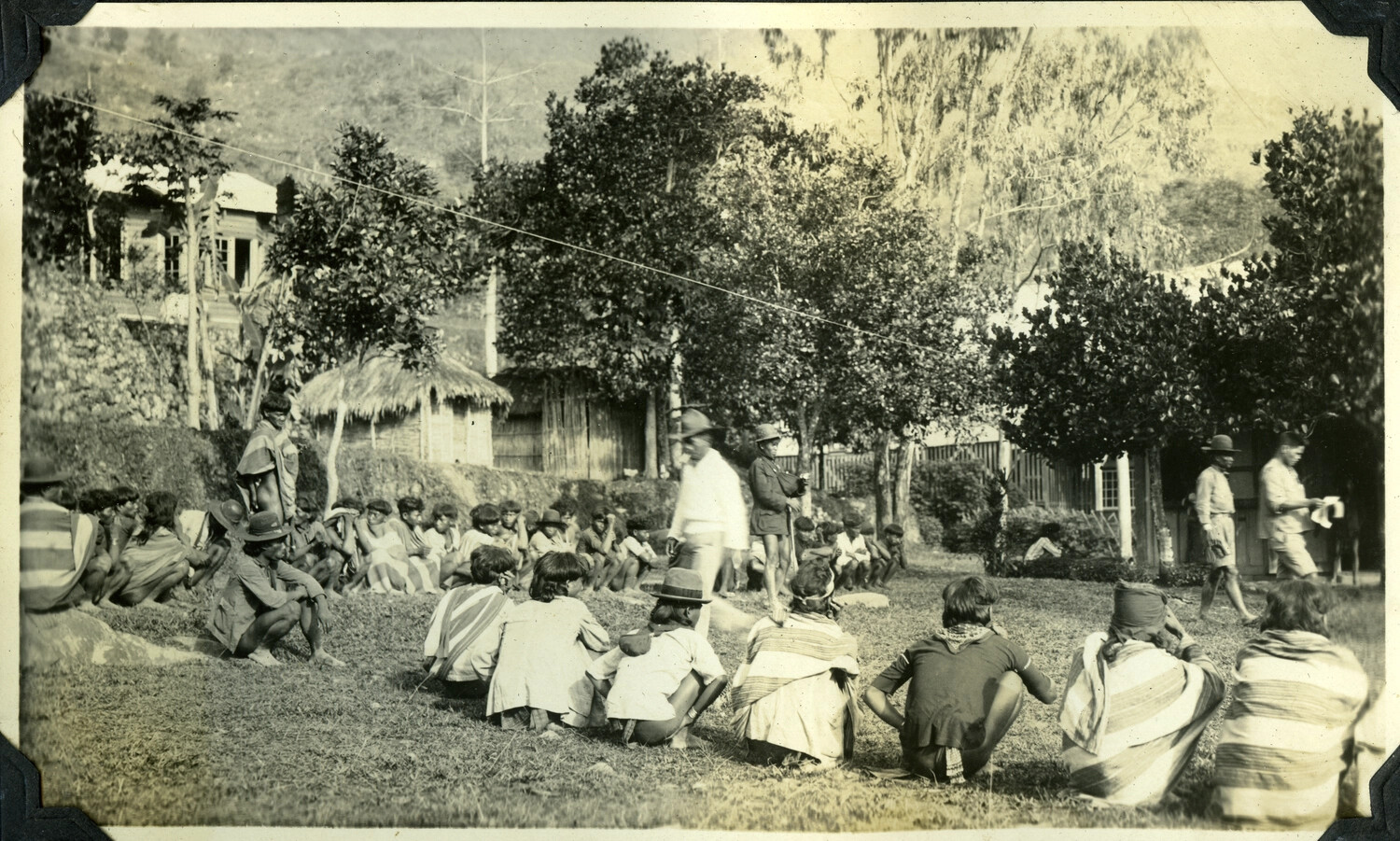 Gathering of Filipino Highland Villagers with Western Visitors, American Colonial-Era Philippines