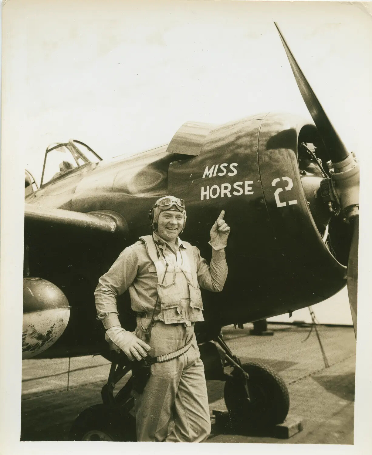 Navy Fighter Pilot Posing with Nose Art "Miss Horse 2" on Carrier Fighter Aircraft