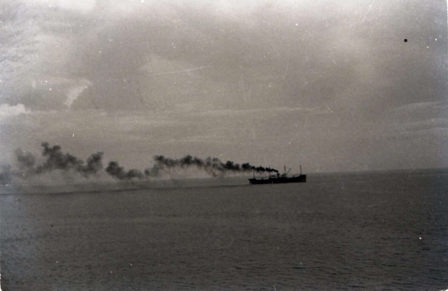 USS Zelima (AF-49) Under Anti-Aircraft Fire, Viewed from USS Yorktown (CV-10), Pacific Theater WWII