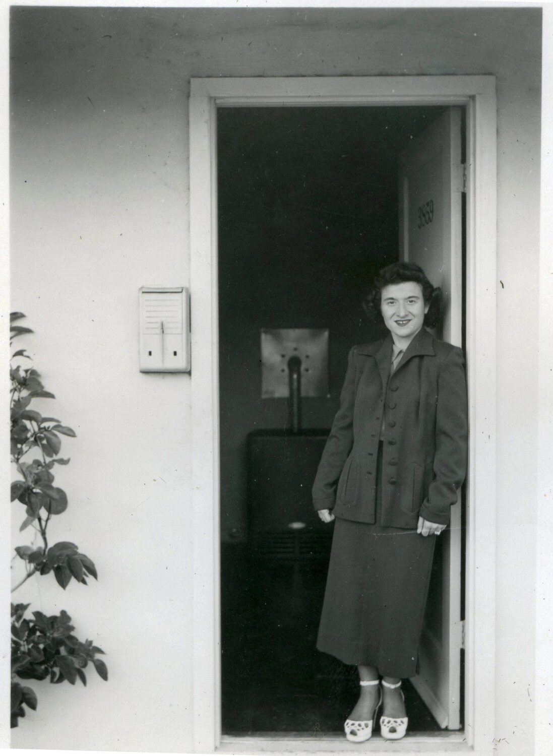 Woman in Doorway, Home-Front Portrait, Late 1940s/Early 1950s