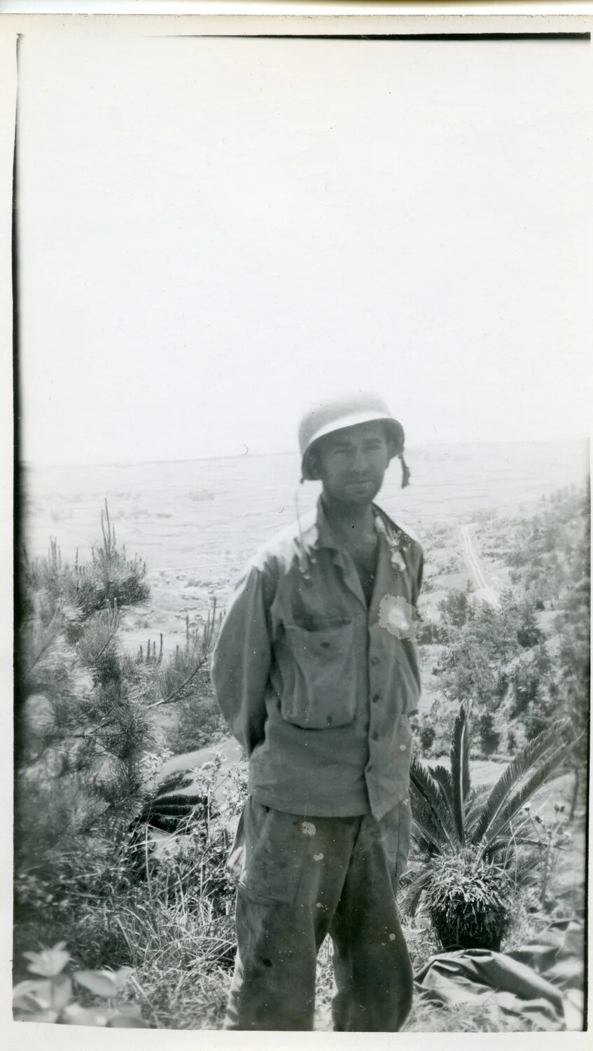 Portrait of an American Serviceman on Hillside Overlook, Likely Okinawa, 1945