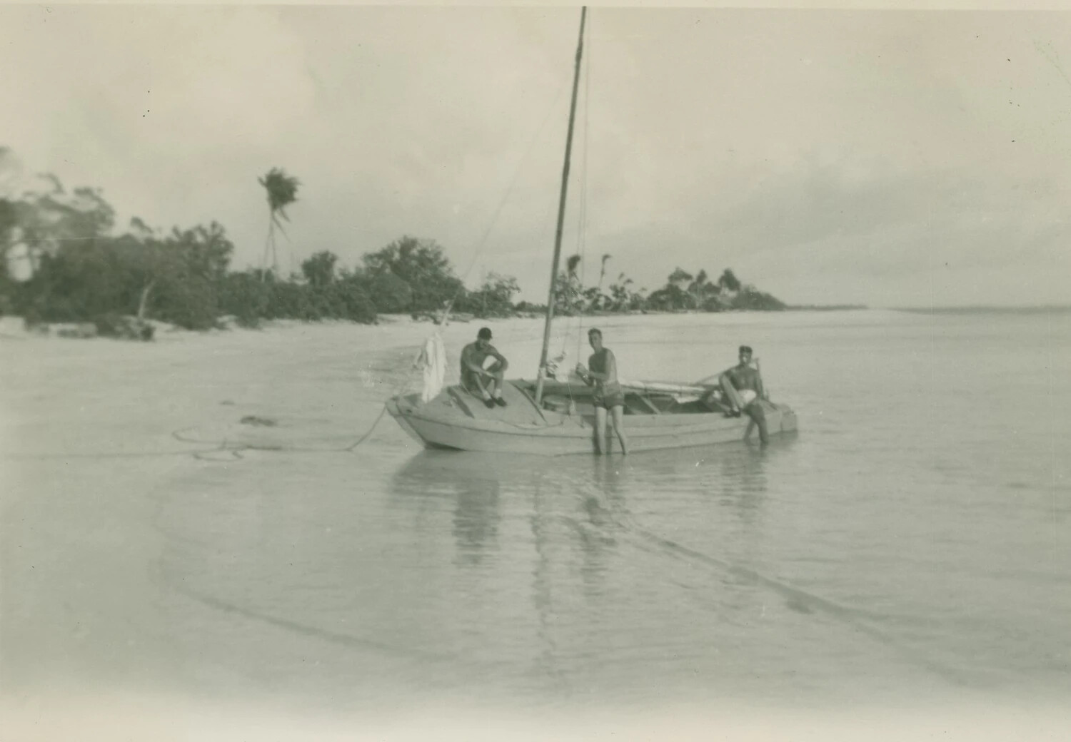 Servicemen with Small Sailboat on Tropical Beach, McAleer Photo Album