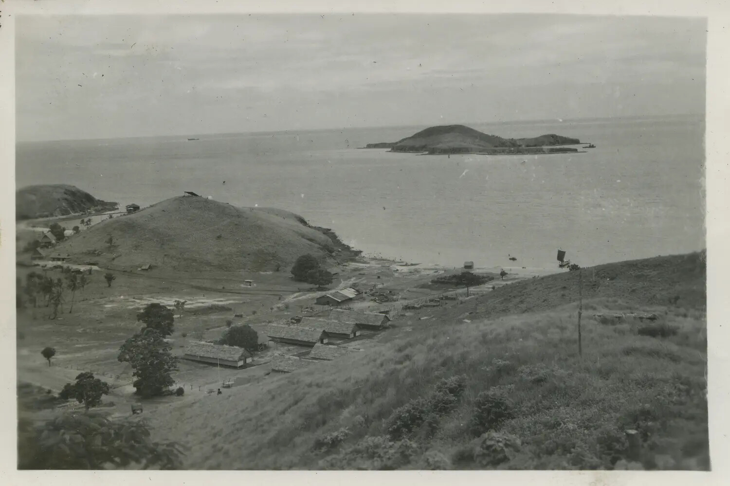 Elevated View of Coastal Base Installation and Bay, Southwest Pacific Area