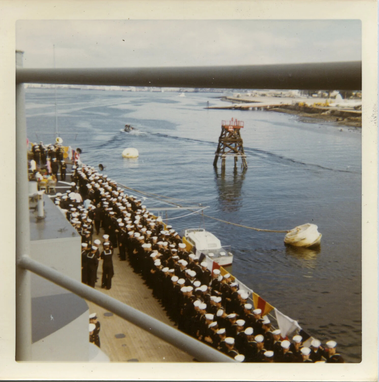 Manning the Rail Ceremony Viewed from the Bridge, USS Saint Paul (CA-73), circa 1970