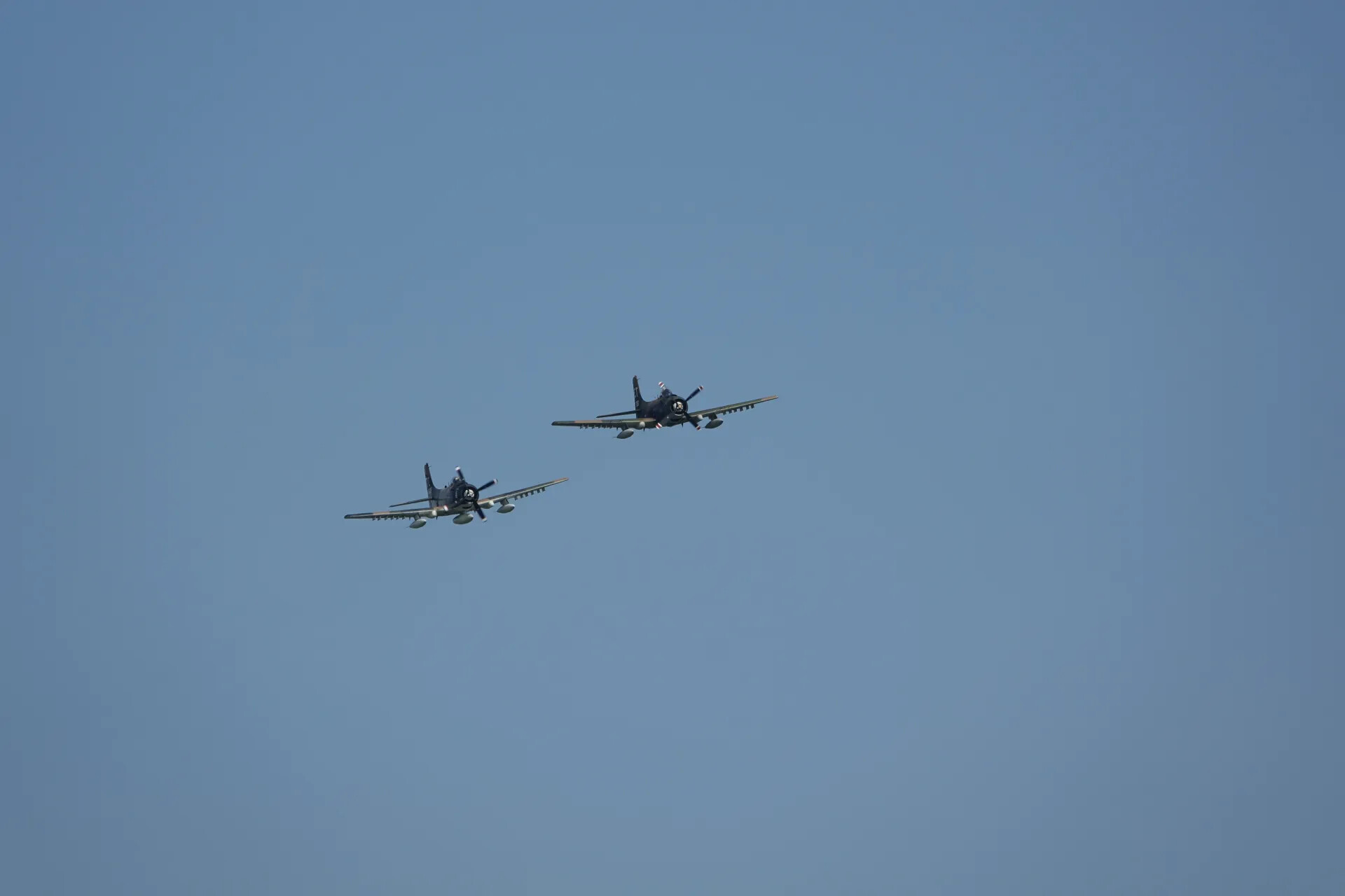 Two Douglas A-1 Skyraiders in Formation Flight, May 2019 Warbird Event