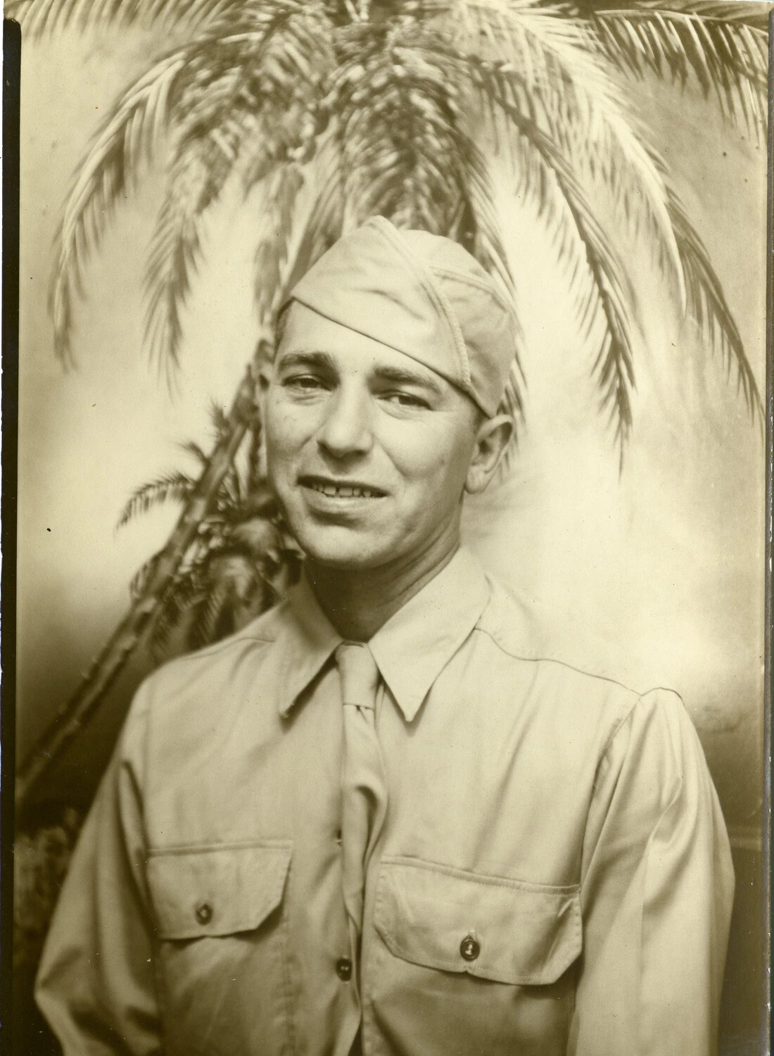 Studio Portrait of American Serviceman with Palm Tree Backdrop, Joe Vieira Collection, WWII Era