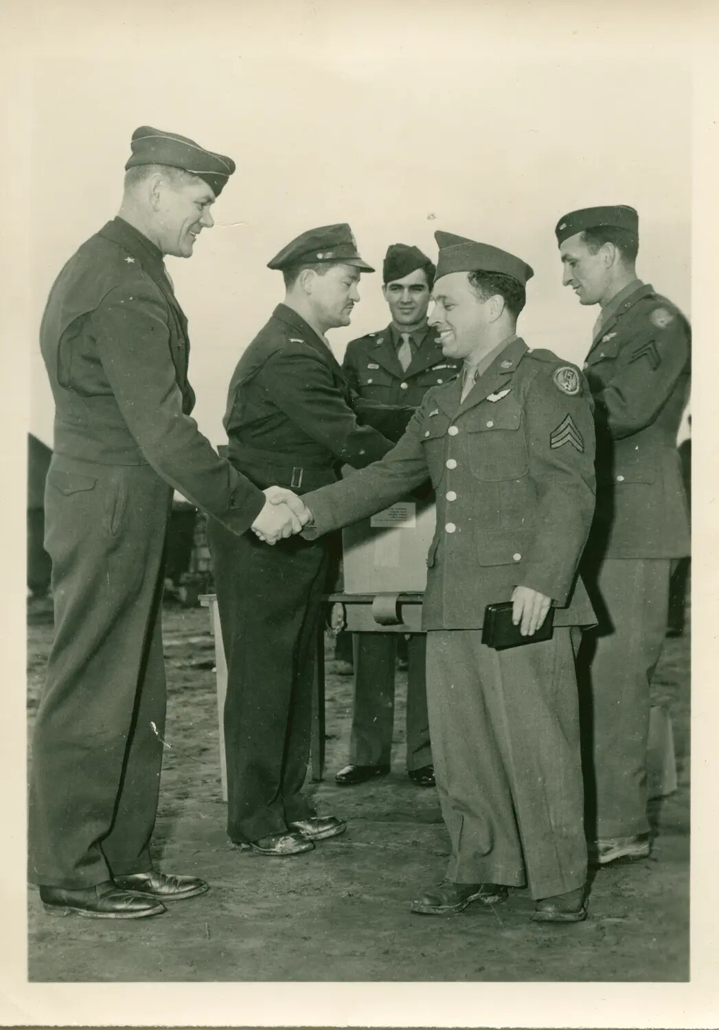 USAAF General Presenting Award to B-24 Belly Gunner Sergeant, 1944