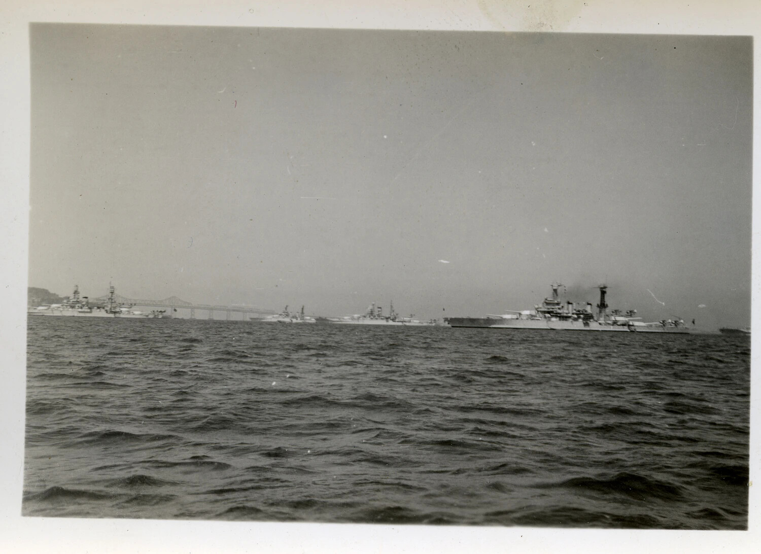 U.S. Navy Warship Underway Near the San Francisco-Oakland Bay Bridge, WWII Era