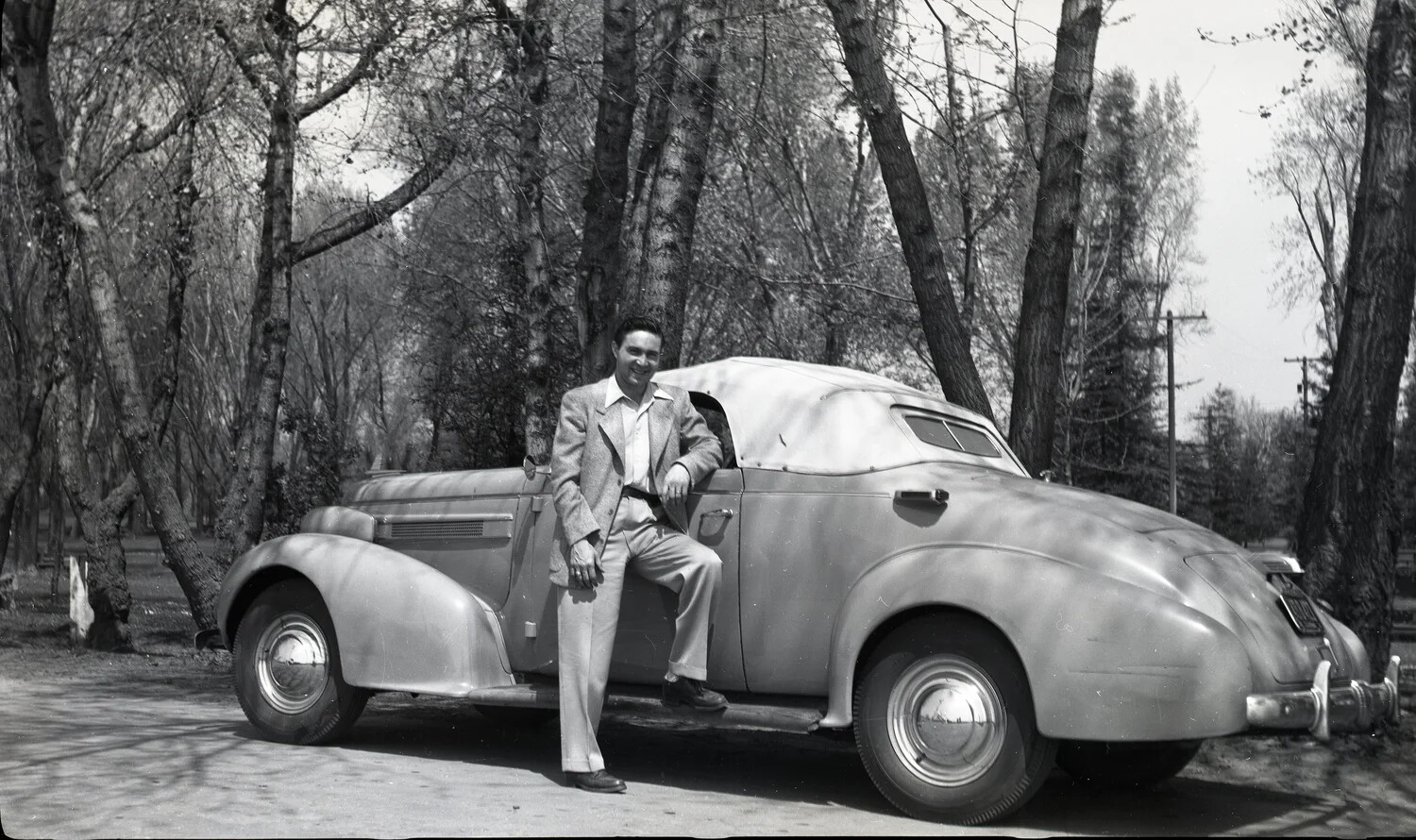 Man Posing with Cord-Style Convertible Automobile, Kelley Family Album