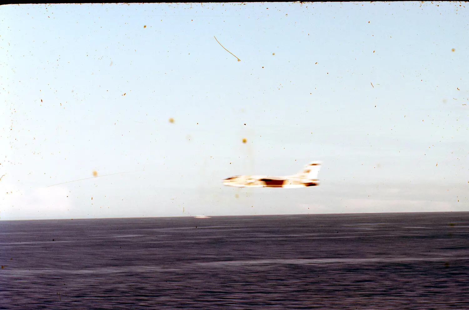 Jet Aircraft in Low-Level Pass Over Ocean During Fleet Exercise, Vietnam War Era