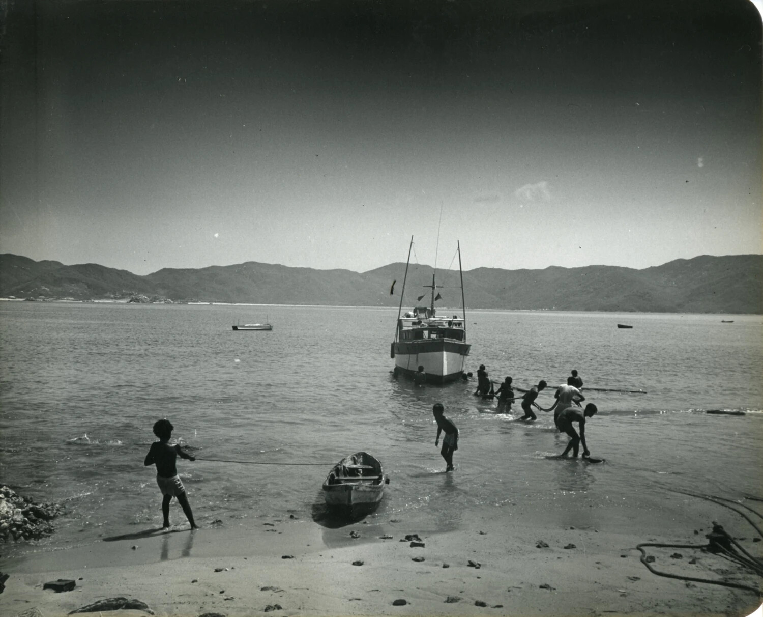 Boys Hauling Boats Ashore in a Coastal Bay, Mexico, 1949