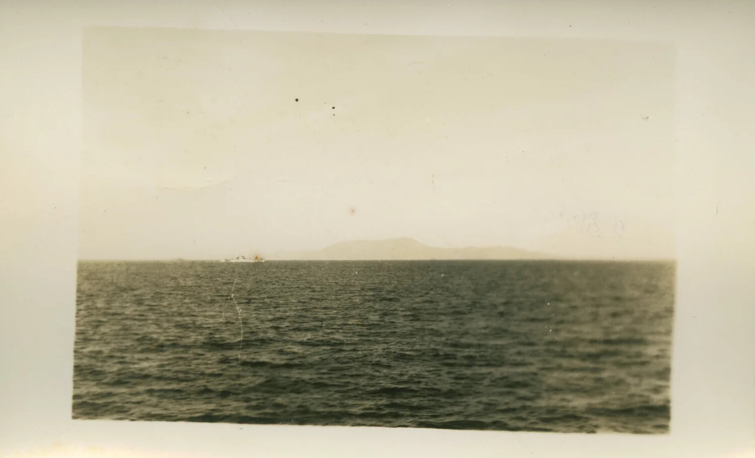 Distant Coastline and Vessel Silhouette — WWII Leyte Campaign, Philippines