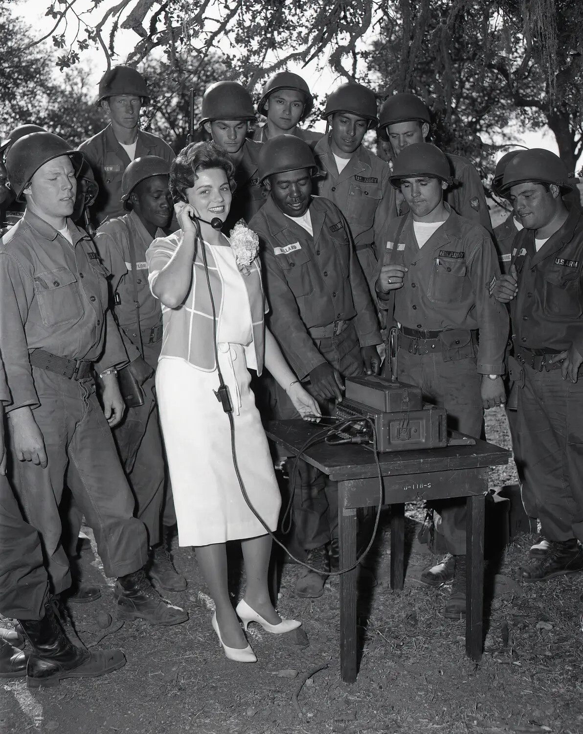Miss California Uses Field Telephone with Guardsmen at Communications Demonstration, Summer Camp, July 1960