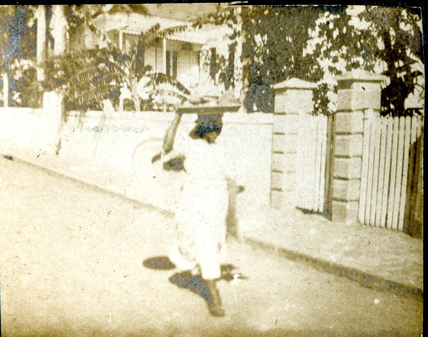 Sailor Walking Past Garden Wall in Tropical Port Town, Candid Snapshot, c. 1900s