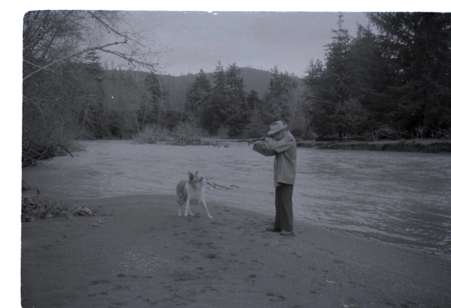 Man with Rifle and Dog on Riverbank, 'Ranch,' 1958