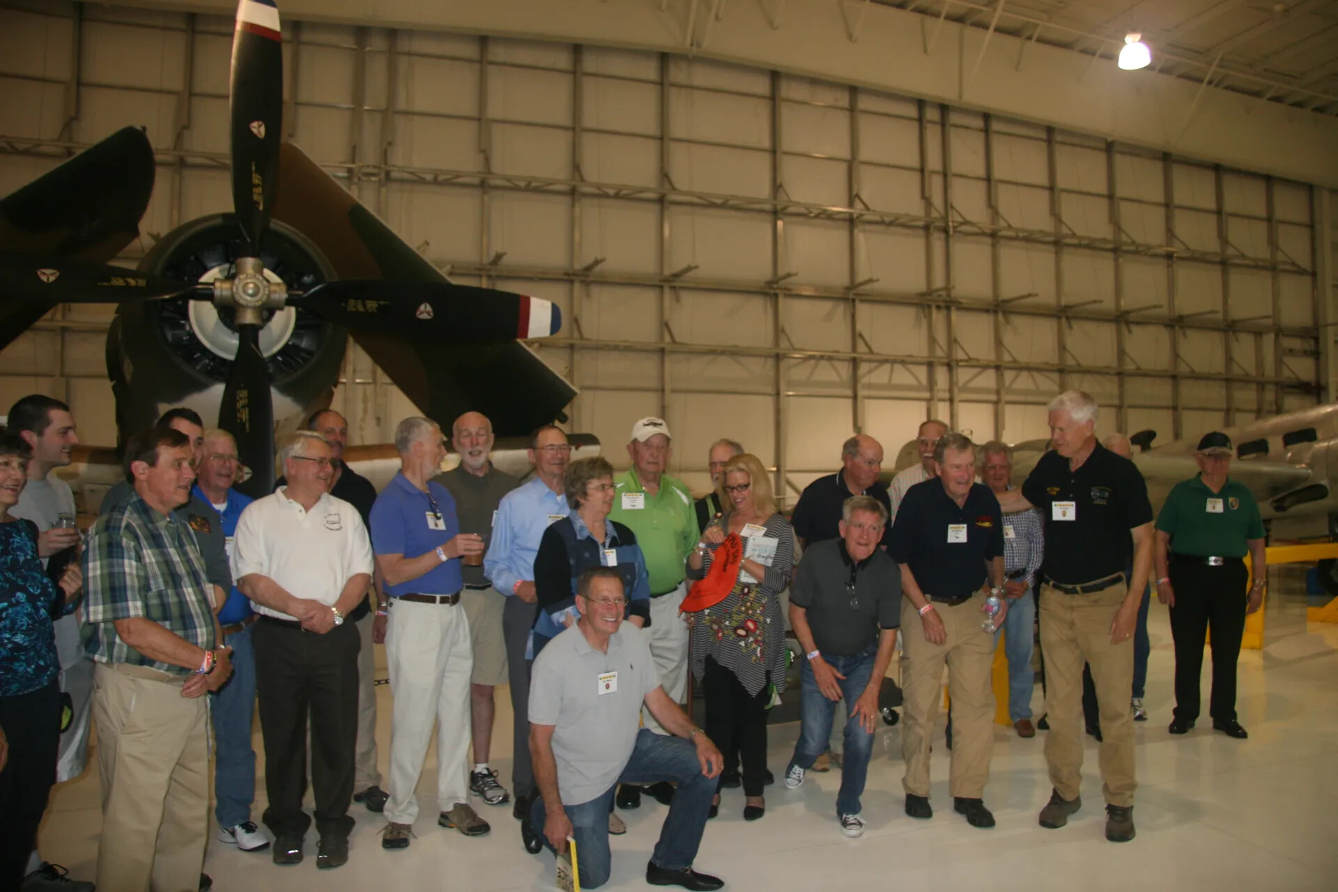 Group Reunion Photo Beneath A-1 Skyraider Aircraft, Alternate Frame