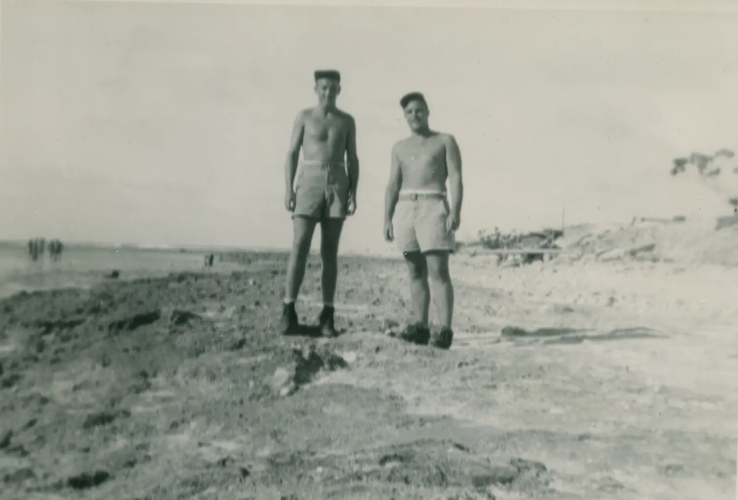 Two Servicemen Relaxing on a Beach