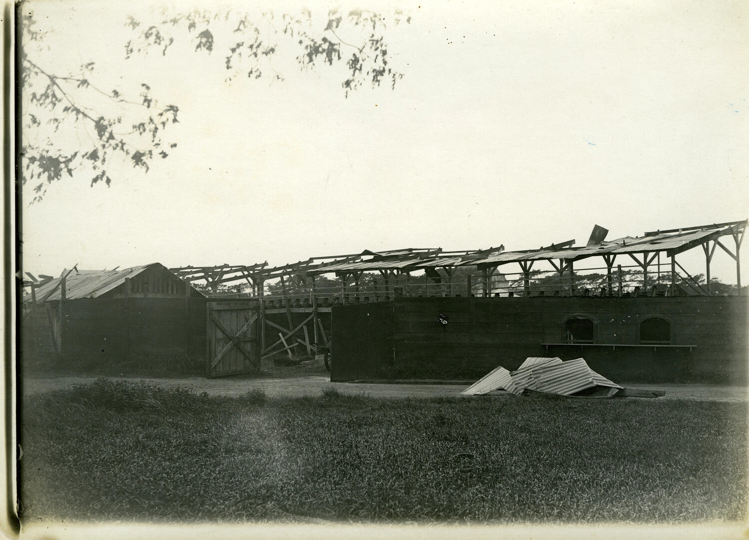 Typhoon-Damaged Building with Torn Roofing, Philippines, Early 1900s (Carl Stone Album)