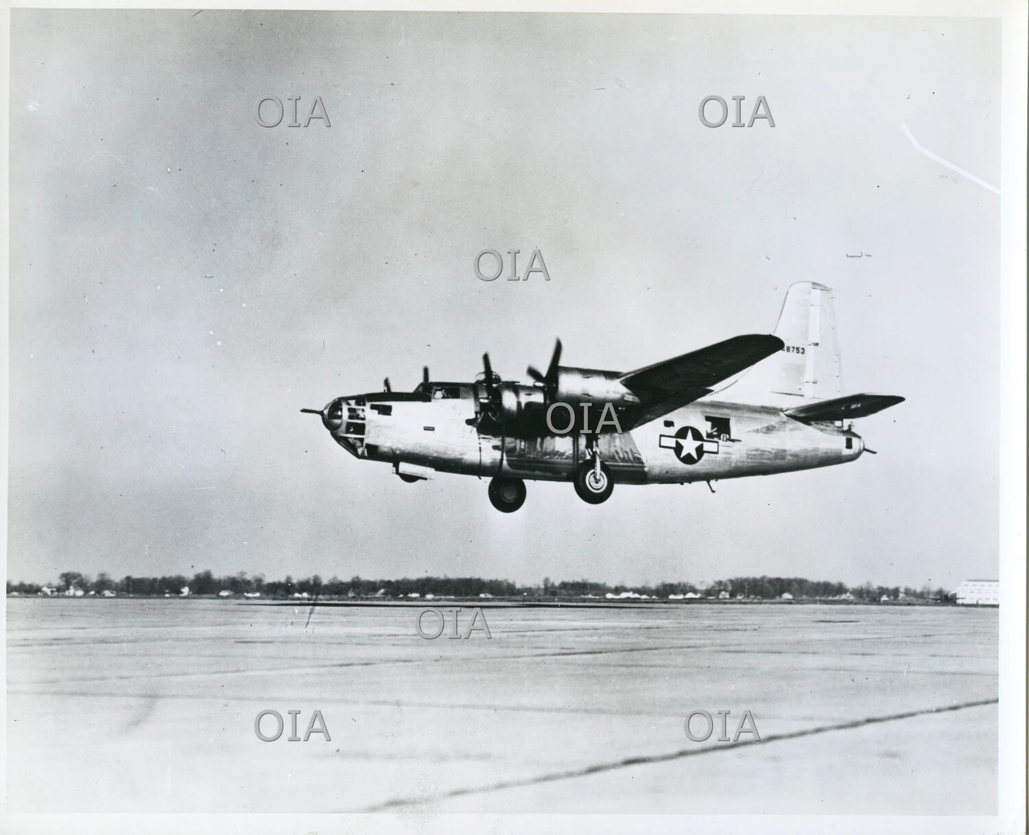Twin-Engine U.S. Military Aircraft in Low Flight, Landing Gear Extended (Archive-Labeled 'Convair')