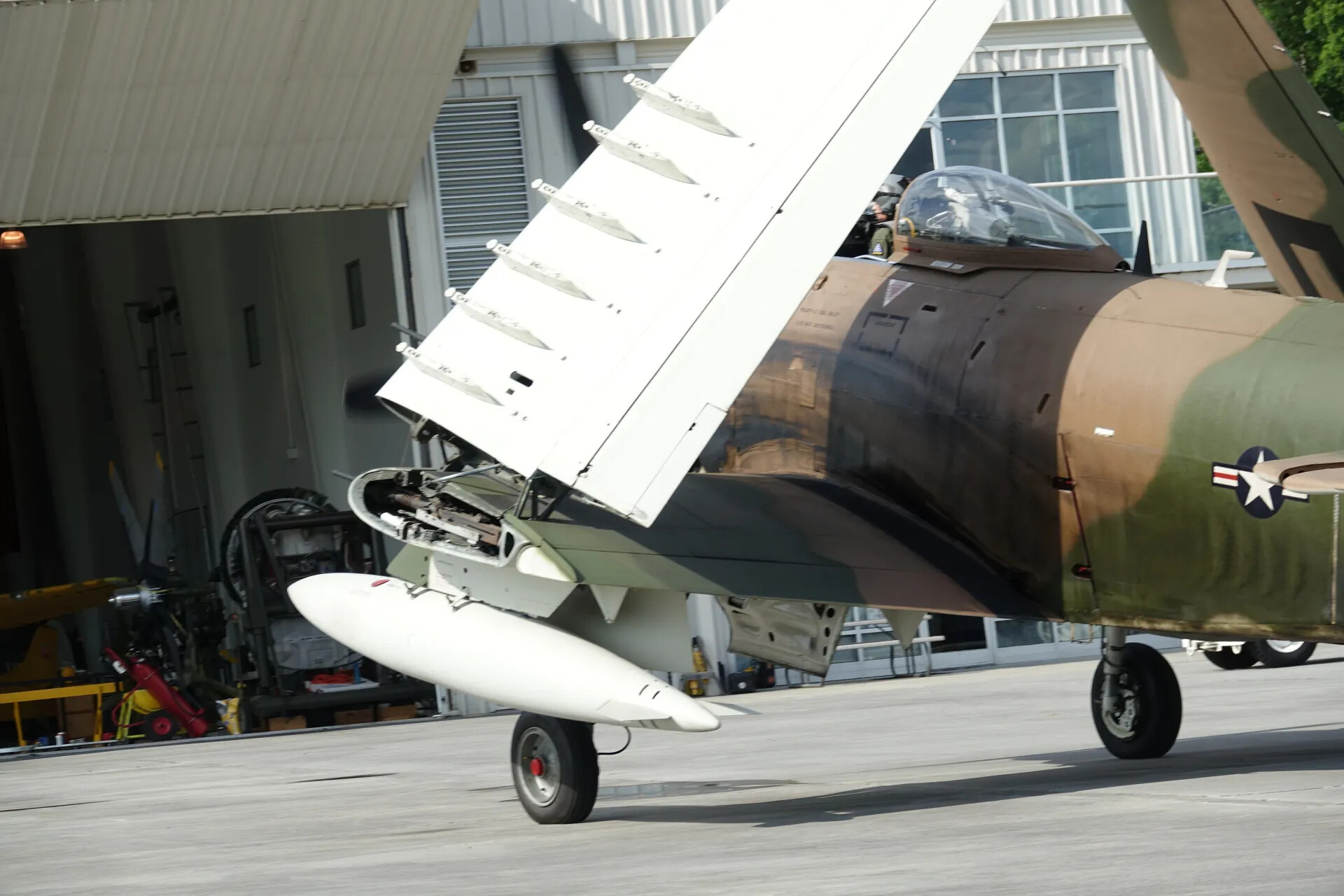 Douglas A-1 Skyraider — Close Detail of Folded Wing, Gun Bay, and Cockpit