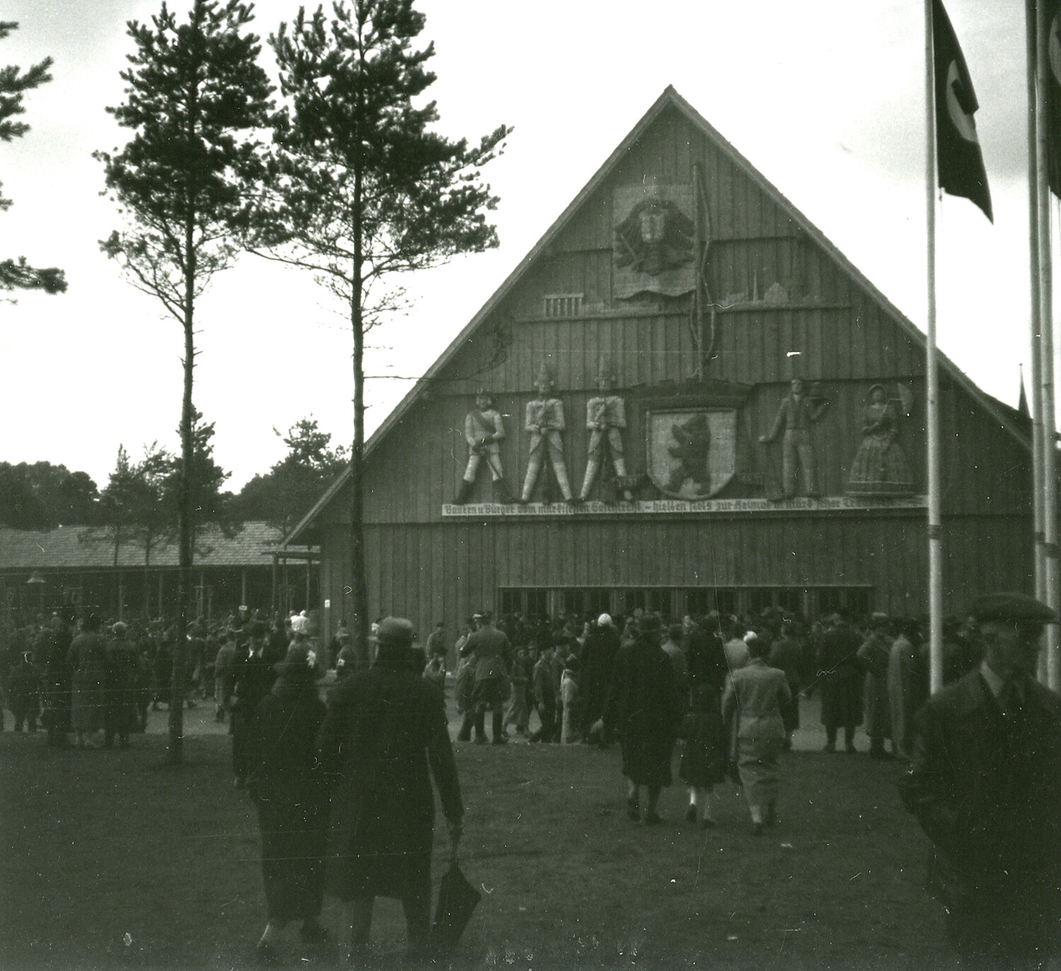 Wooden Exhibition Pavilion with Nazi Flags and Crowd, Nuremberg Area, Germany, WWII Era