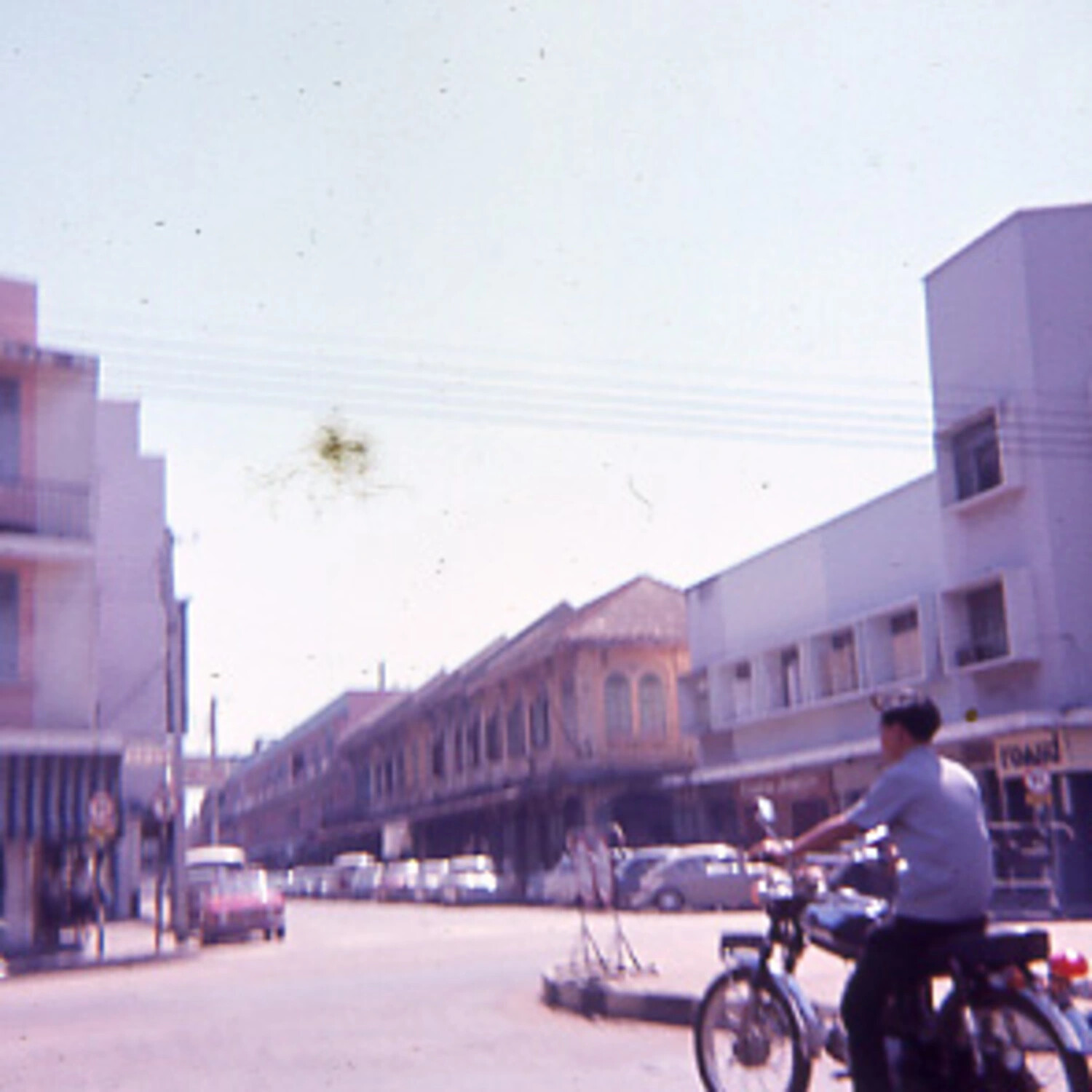 Colonial-Era Shophouse Street with Bicyclist, Thailand, Vietnam War Era
