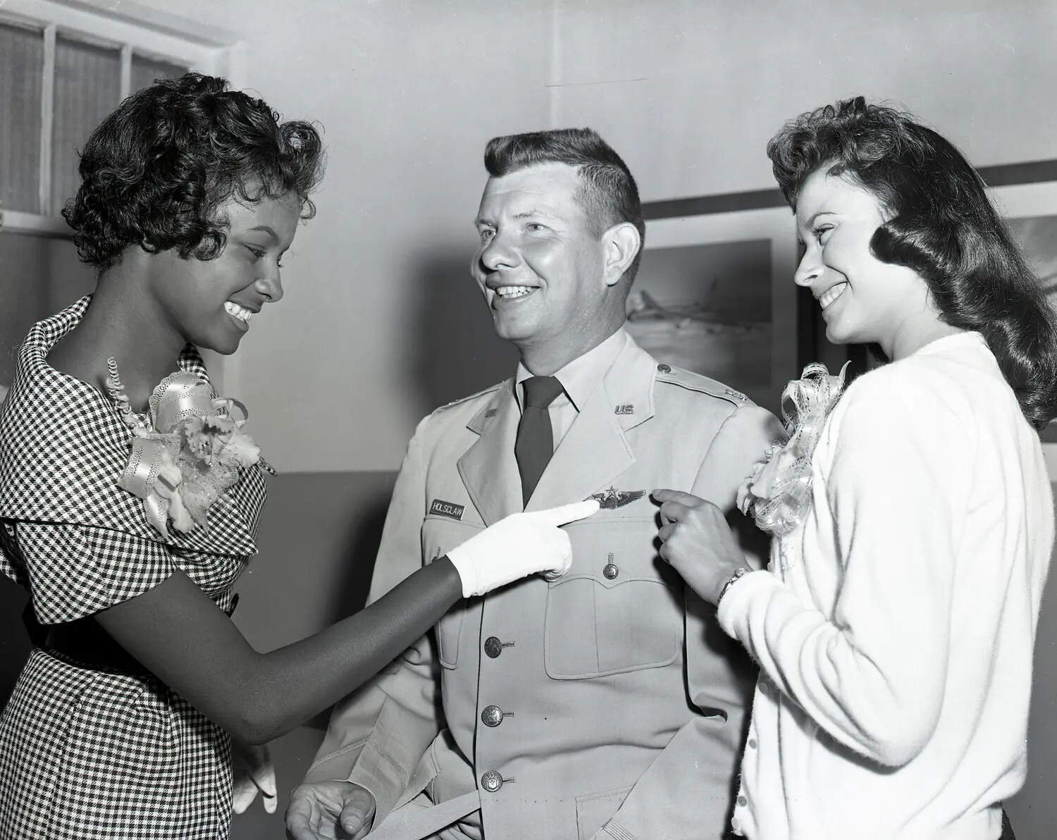 Ceremonial Insignia Pinning: Two Young Women Honor Air National Guard Officer 'Holsclaw'