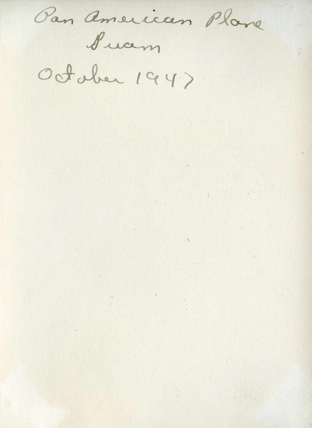 Handwritten Album Caption Page: 'Pan American Plane, Guam, October 1947'
