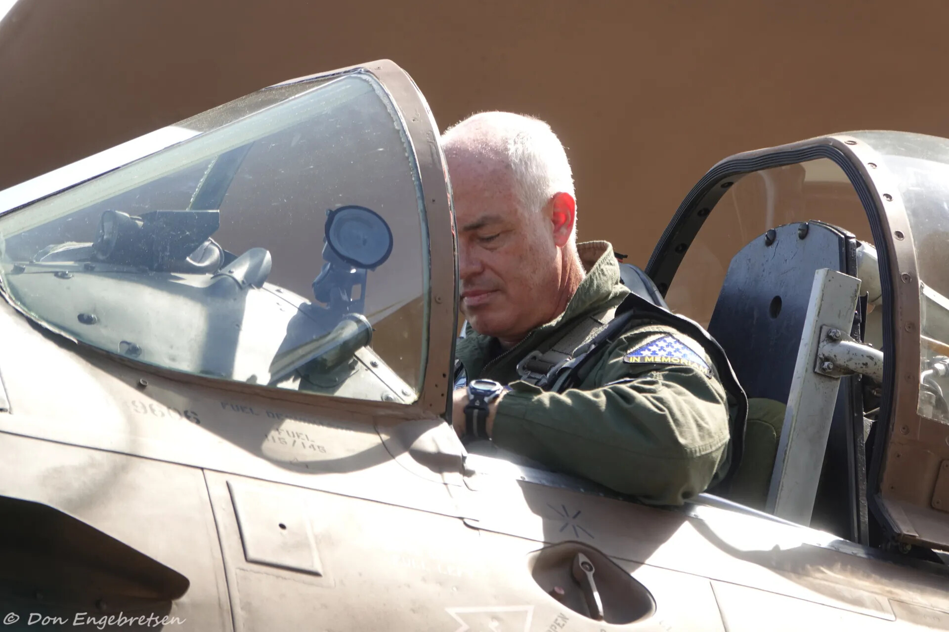 Veteran in A-1 Skyraider Cockpit Wearing 'In Memoriam' Patch, Reunion Event