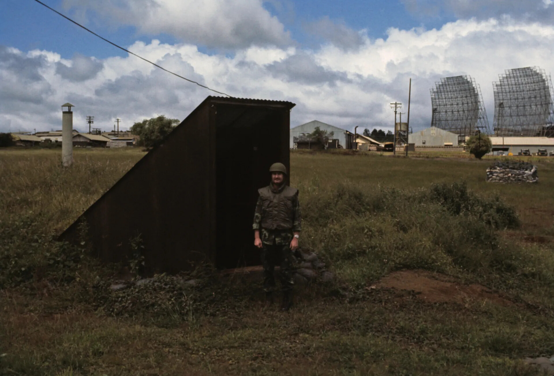 Serviceman at Bunker Entrance with Radar Installation in Background, Don Engebretsen Slide Collection
