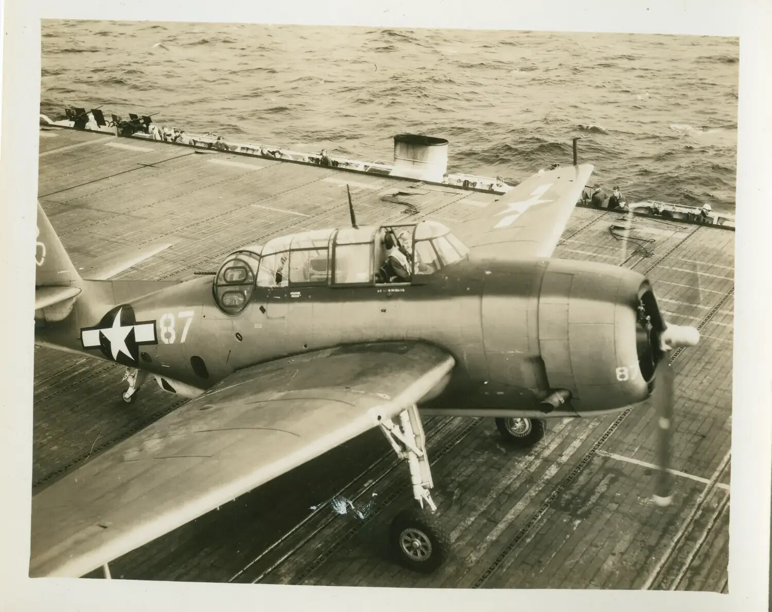TBM/TBF Avenger No. 87 on Flight Deck of USS Petrof Bay (CVE-80), WWII