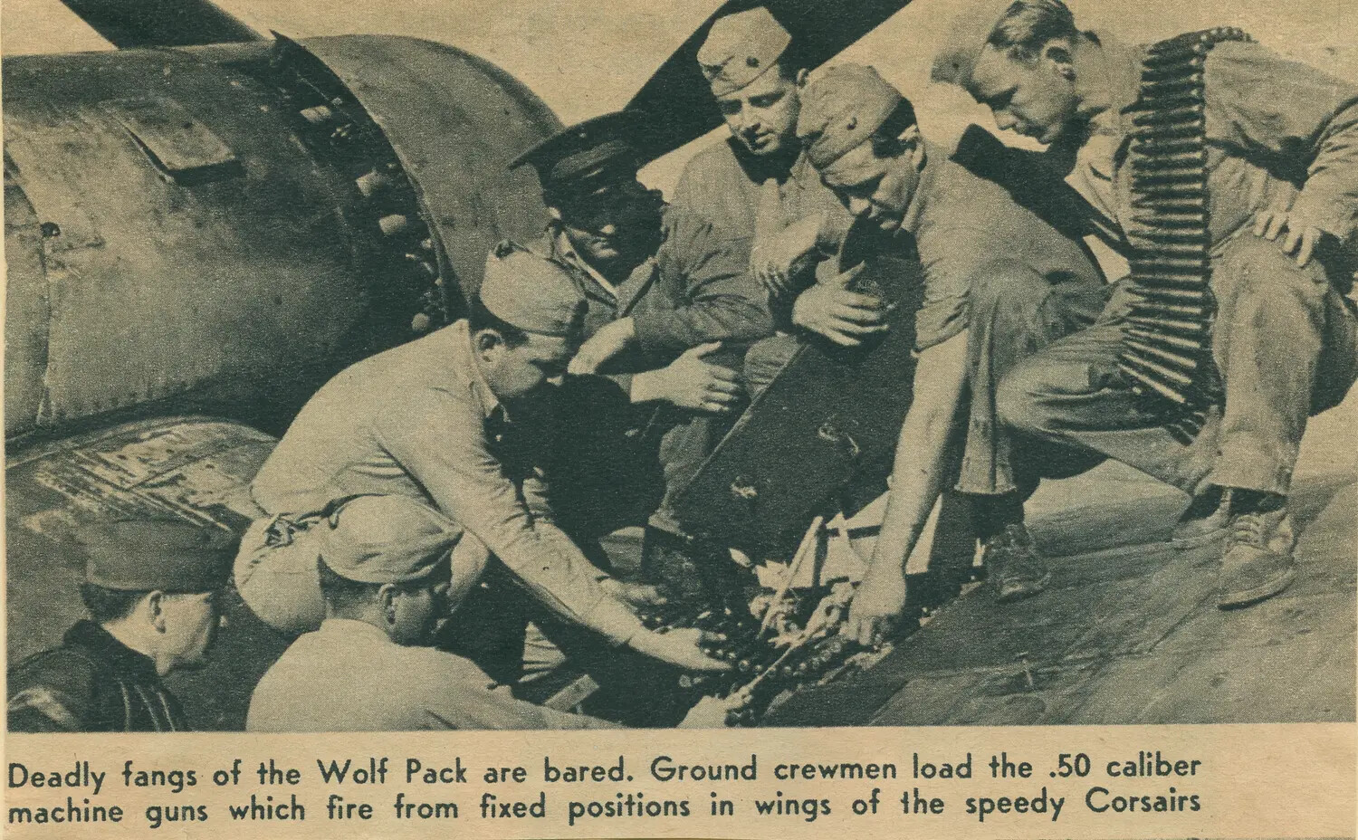Ground Crew Loading .50 Caliber Ammunition into F4U Corsair Wing Guns, 'Wolf Pack' Squadron, WWII