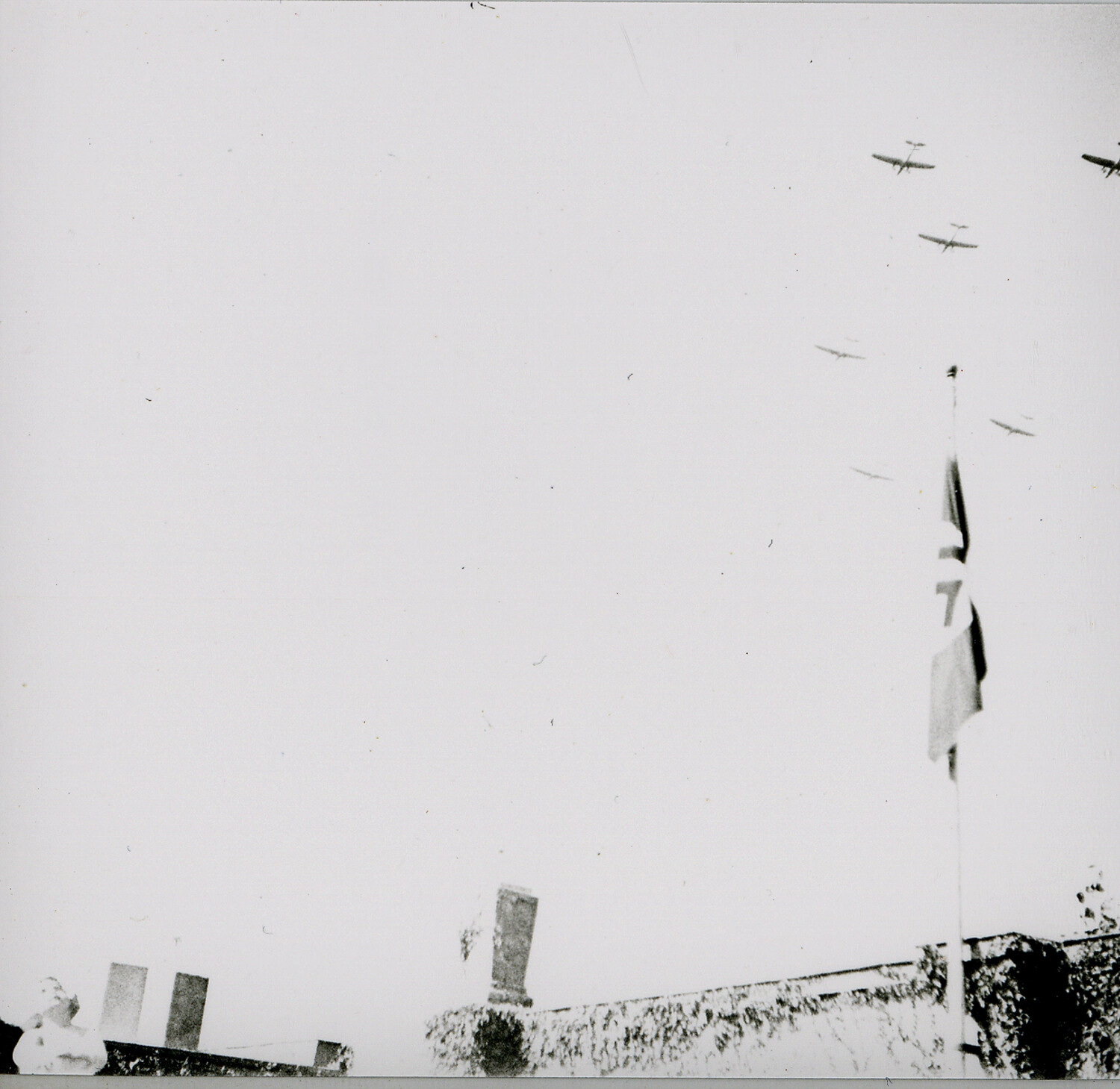 Biplane Formation Over a Fortified Wall with Numbered Flag, Nuremberg Negatives (WWII-era)