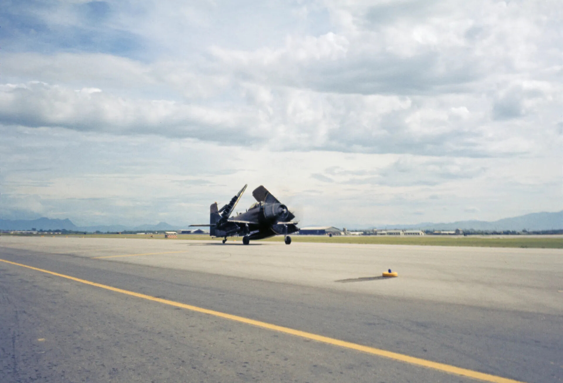 A-1 Skyraider Taxiing on Runway, Southeast Asia Air Base, c. 1970 (Don Engebretsen Slide Collection)