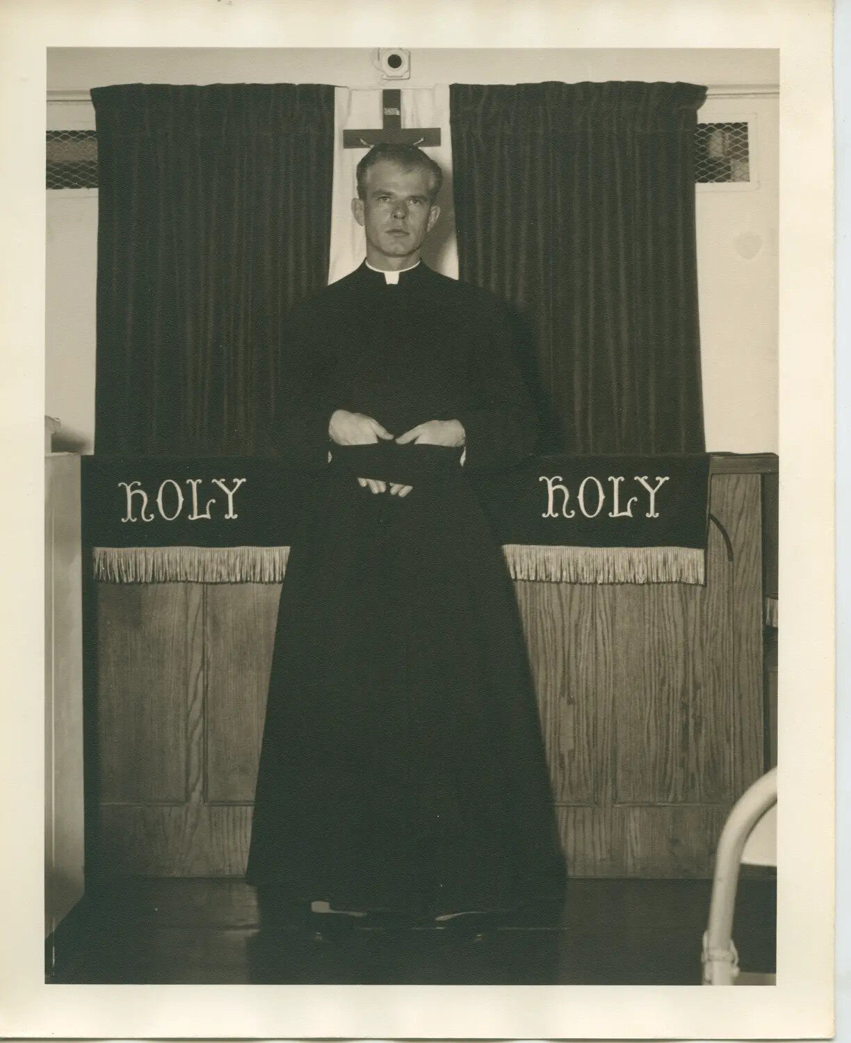 U.S. Navy Chaplain at Shipboard Altar, USS Petrof Bay (CVE-80)