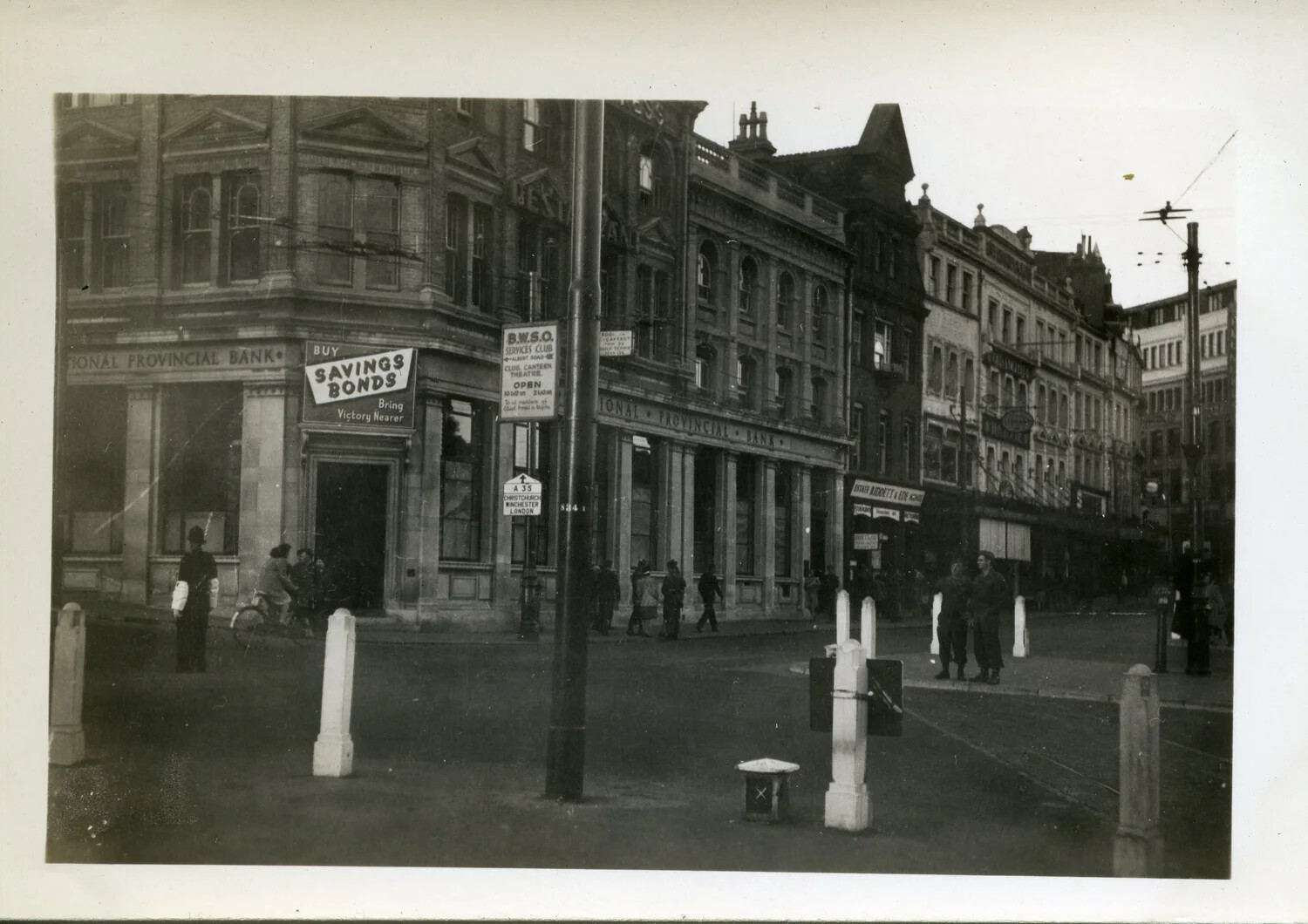 Street Corner View with National Provincial Bank and Services Club Signage, England, WWII, 44th Infantry Division Collection