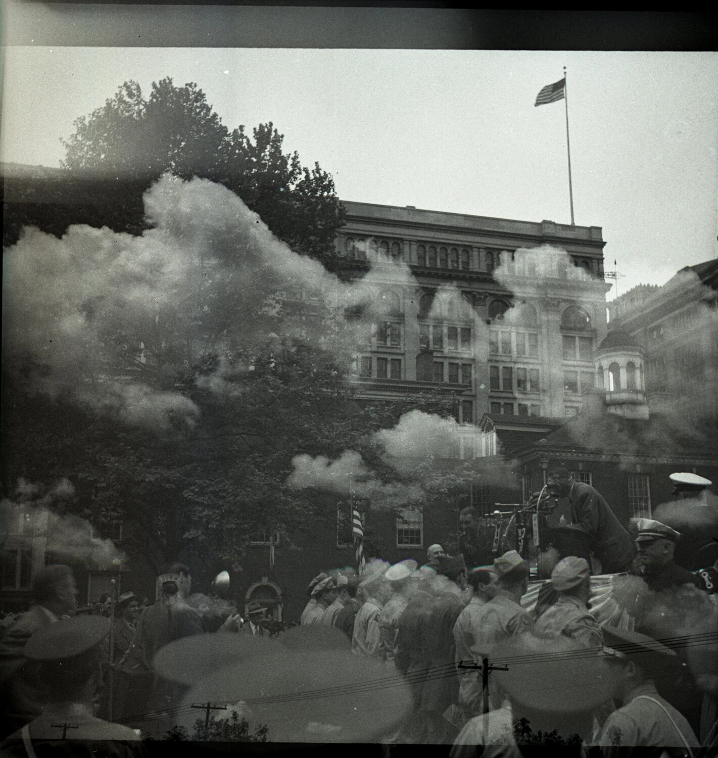 Double-Exposed Negative: Military Band Crowd and Street/Building Scene