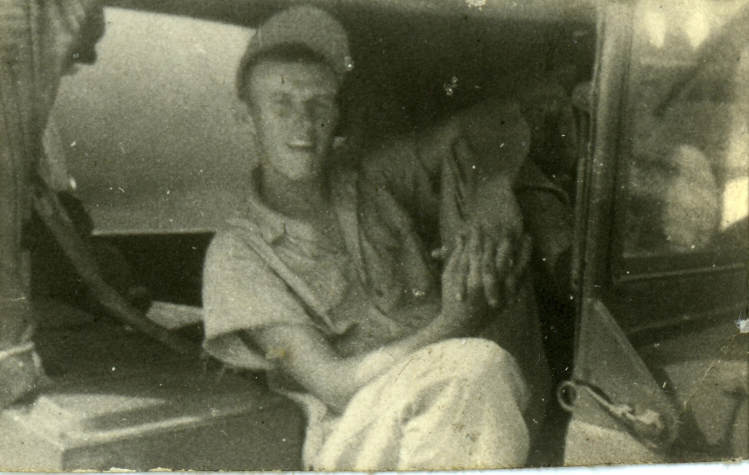 U.S. Serviceman Seated in Truck Cab, Okinawa, 1945