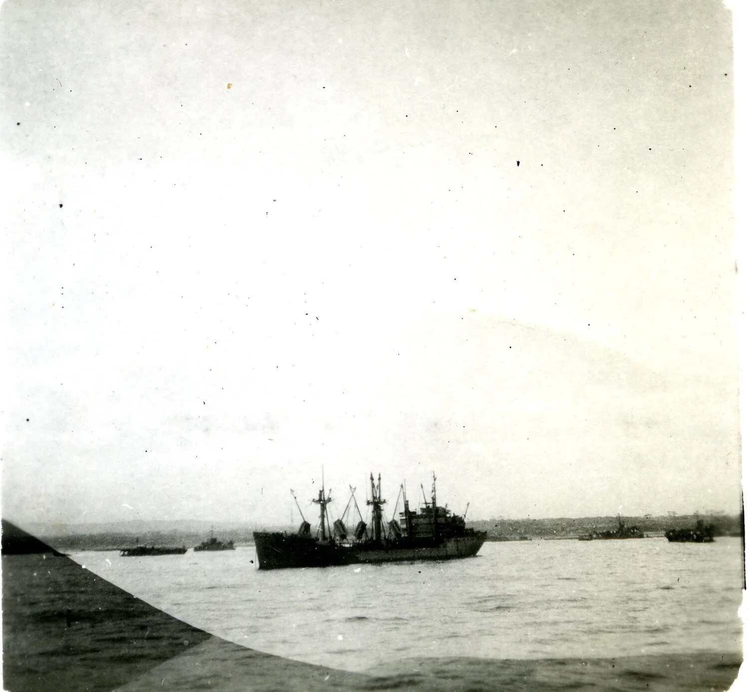 Cargo Transport Ship at Anchor, Pacific Harbor, Ie Shima Area, WWII