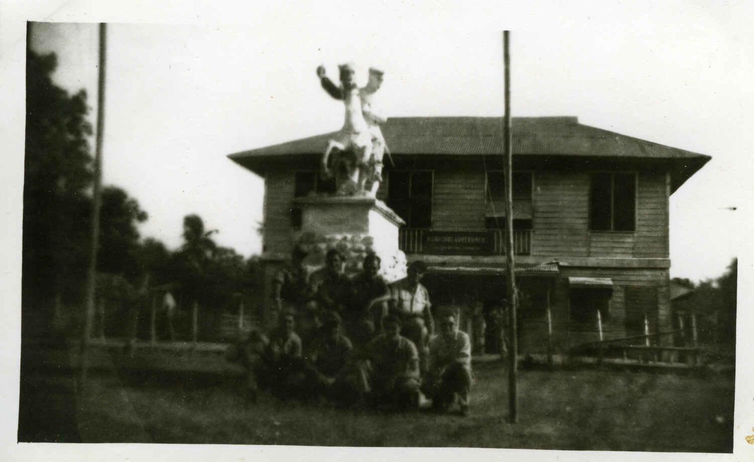 American Servicemen Posed Before Equestrian Statue and Municipal Government Building, Pacific Theater, WWII