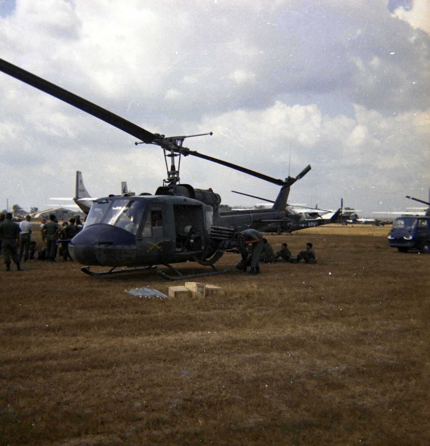 Armed UH-1 'Huey' Gunship on Airfield Apron, Vietnam, 1963