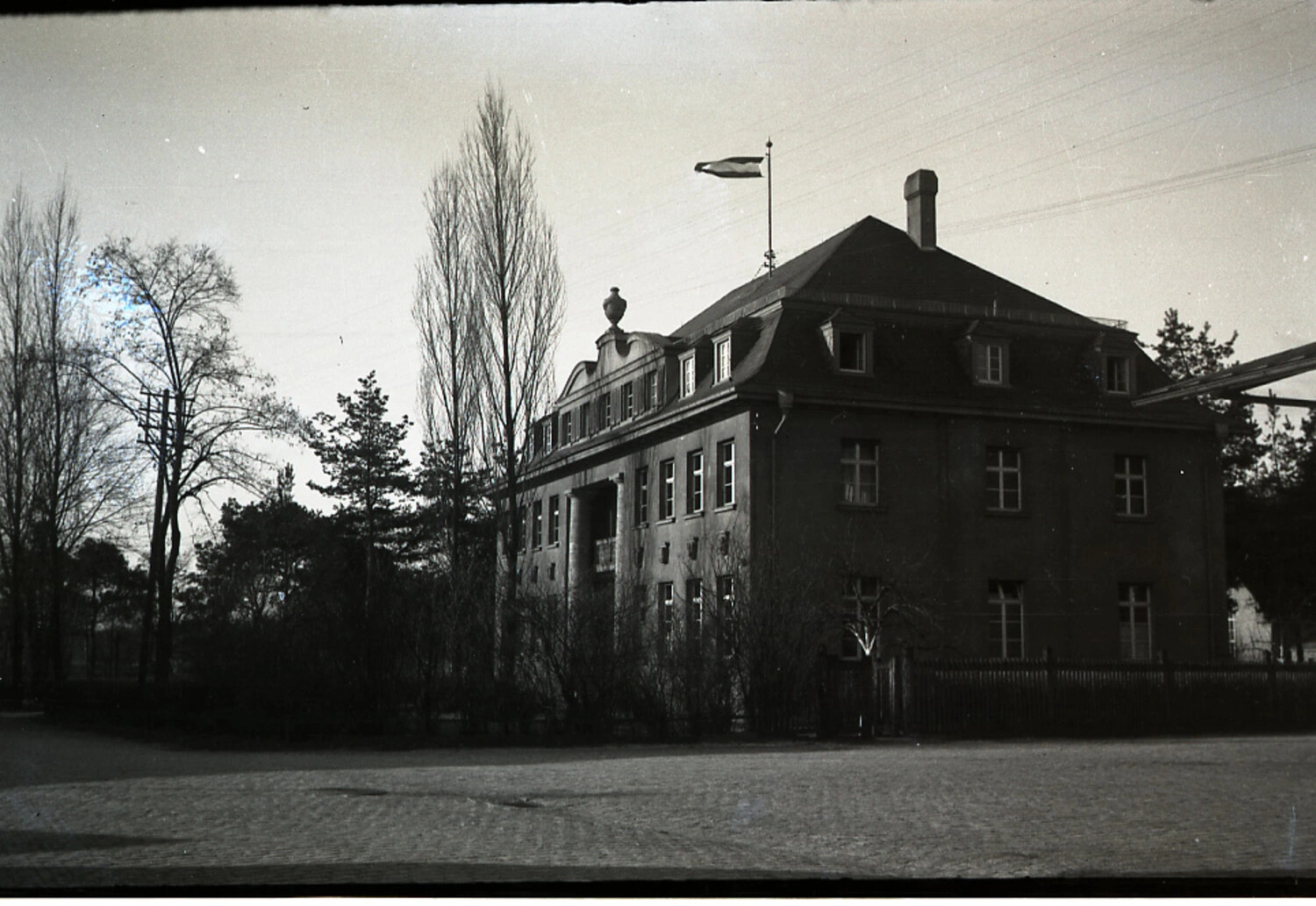 Two-Story Villa with Roof Flag and Mansard Roof, Germany, WWII Era