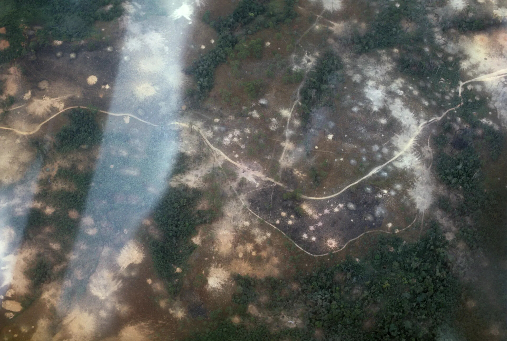 Aerial View of Cratered Terrain, Possible Bombing/Artillery Impact Area, Southeast Asia