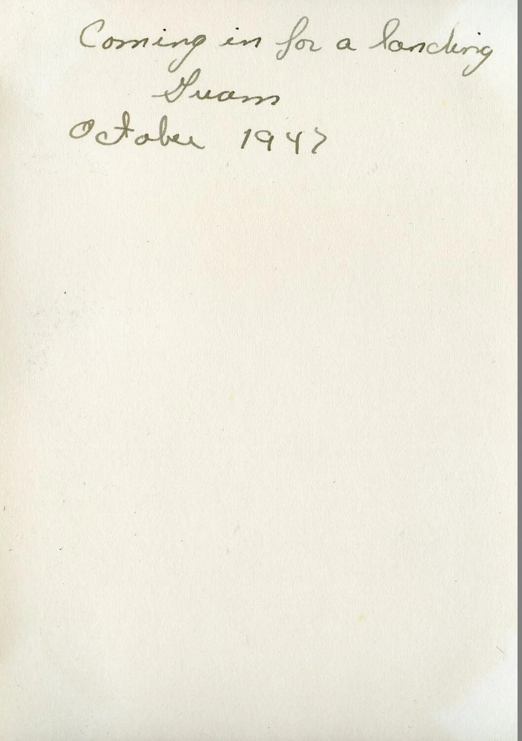 Album Page with Handwritten Caption: 'Coming in for a Landing, Guam, October 194[?]' – VR-6 NATS Album, Agana, Guam