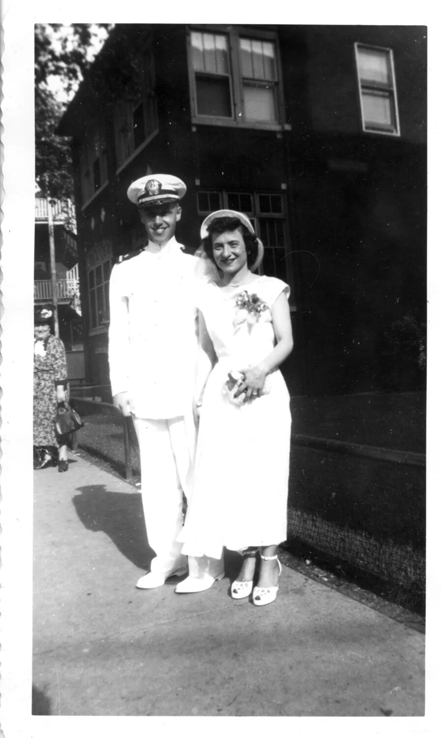 Portrait of a U.S. Navy Officer in Dress Whites with Companion, Likely a Wedding or Engagement Photograph