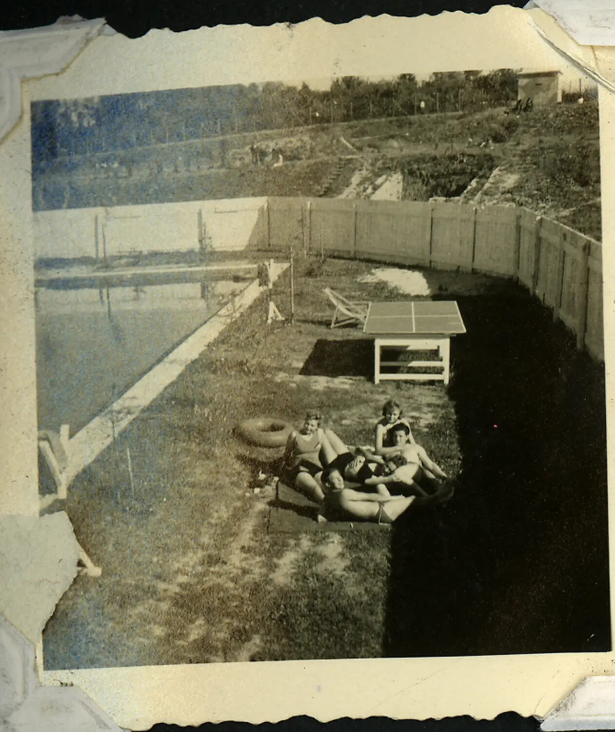 Servicemen and Companions Relaxing Poolside, Rest and Recreation Facility, WWII/Post-War Era