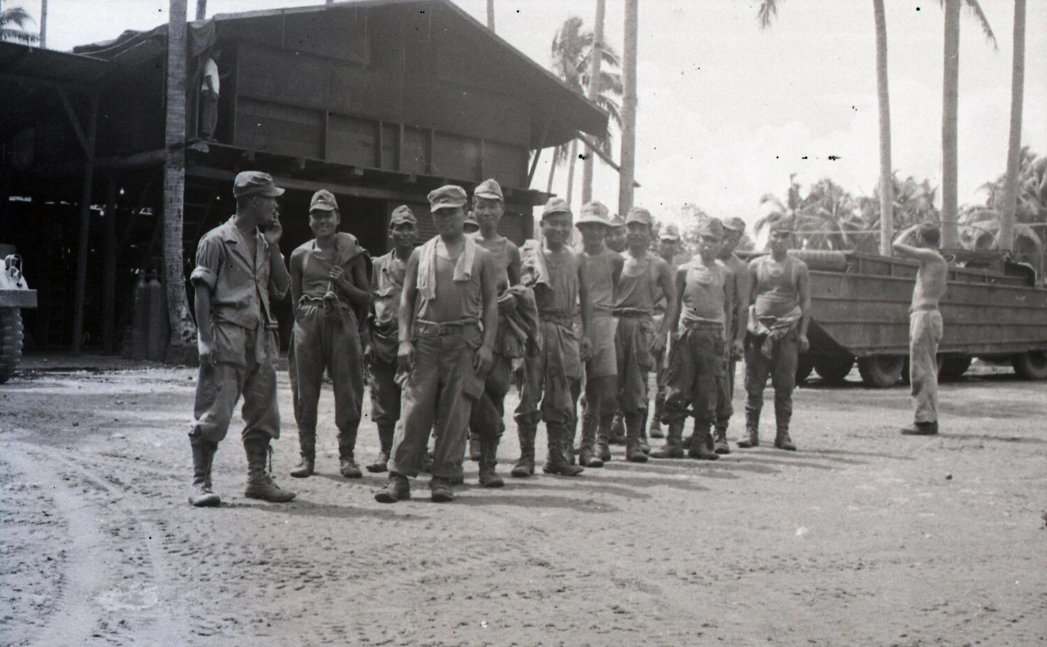 Group Portrait of American Servicemen with DUKW Amphibious Vehicle, Luzon, Philippines, WWII