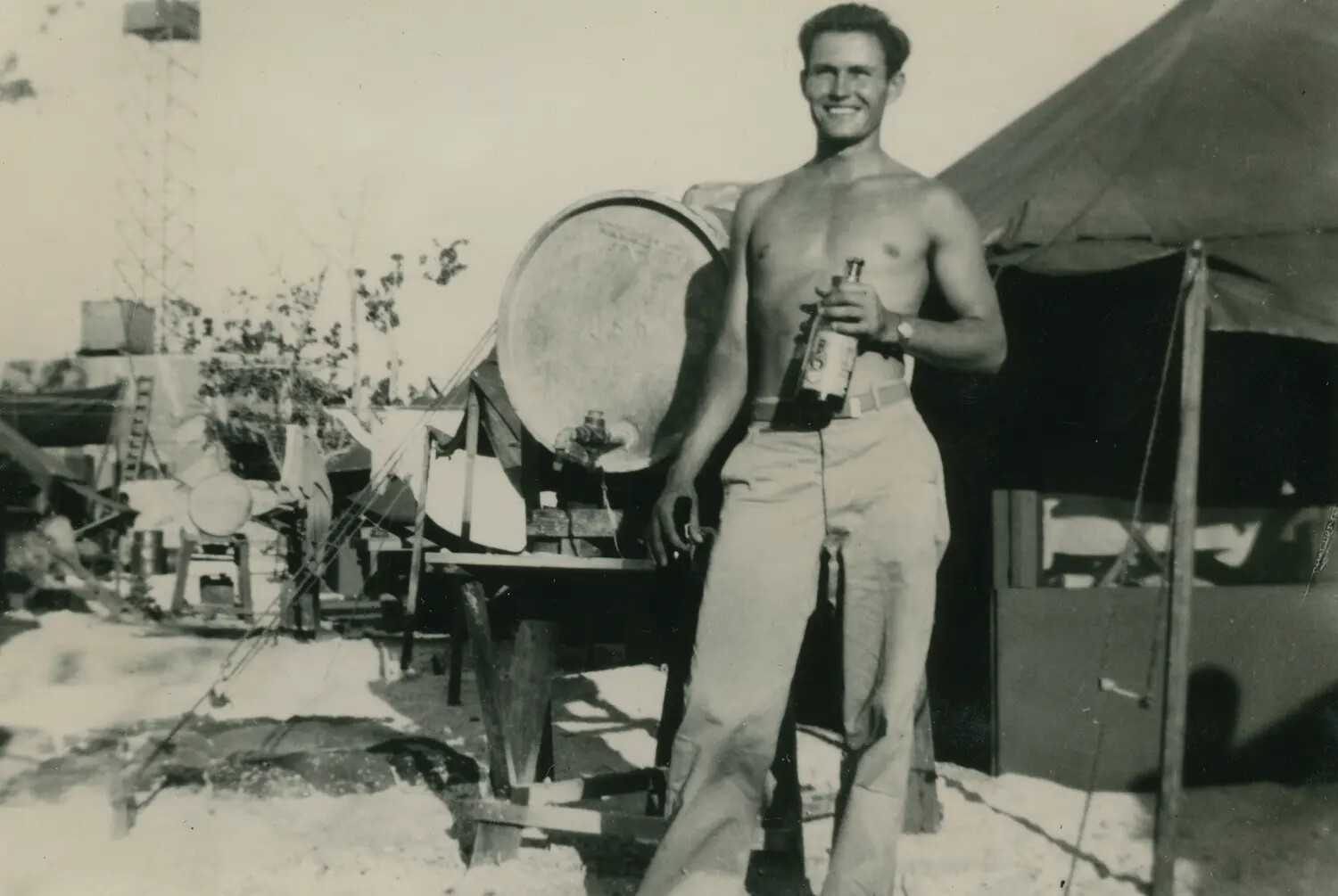 Shirtless Serviceman at Pacific Theater Encampment, WWII, McAleer Collection
