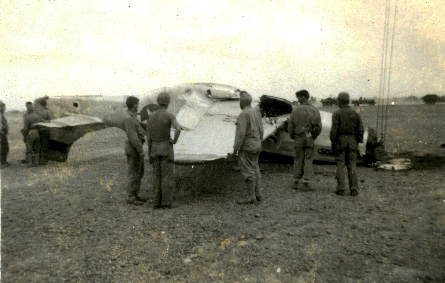U.S. Marines Inspect Crashed Fighter Aircraft Wreckage, Iwo Jima, 1945
