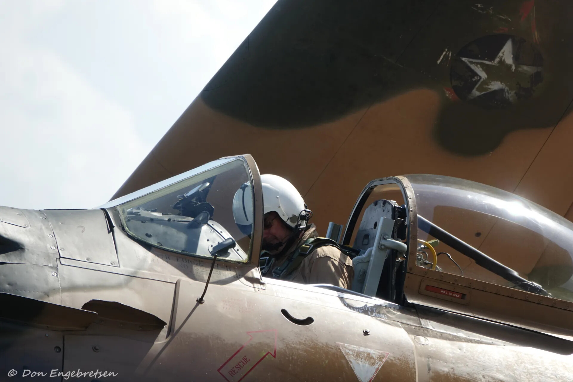 Pilot in Cockpit of A-1 Skyraider, Southeast Asia Camouflage - Reunion Event, May 2019